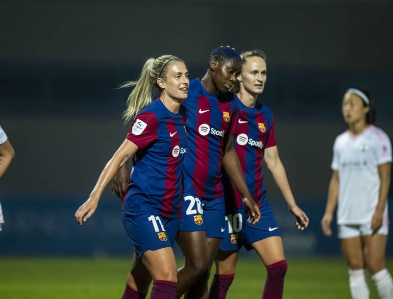 Alexia Putellas celebrates a goal with her teammates