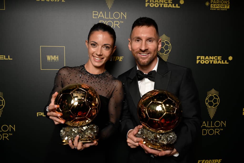 Aitana Bonmati and Lionel Messi with their Ballon d'Or awards