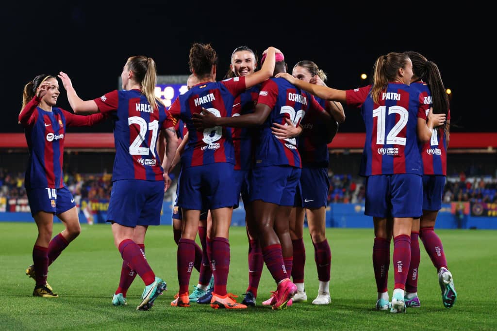 Barcelona Femeni celebrate scoring against Benfica